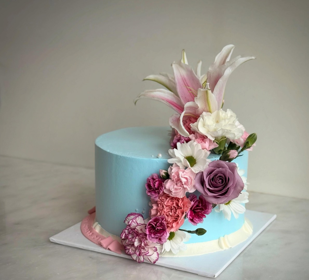 Hand-painted floral buttercream cake