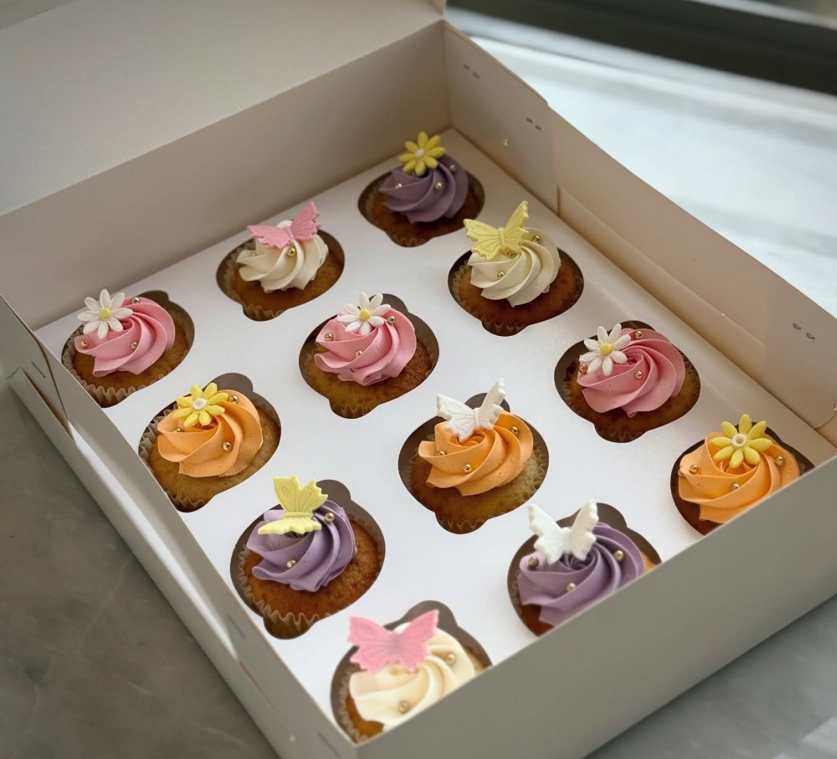 Assorted mini desserts and cupcakes